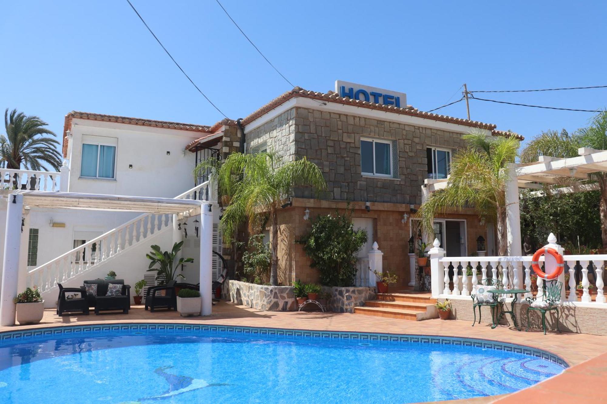 Casa Día Y Noche Hotel